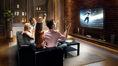 Sports fans watch a football game